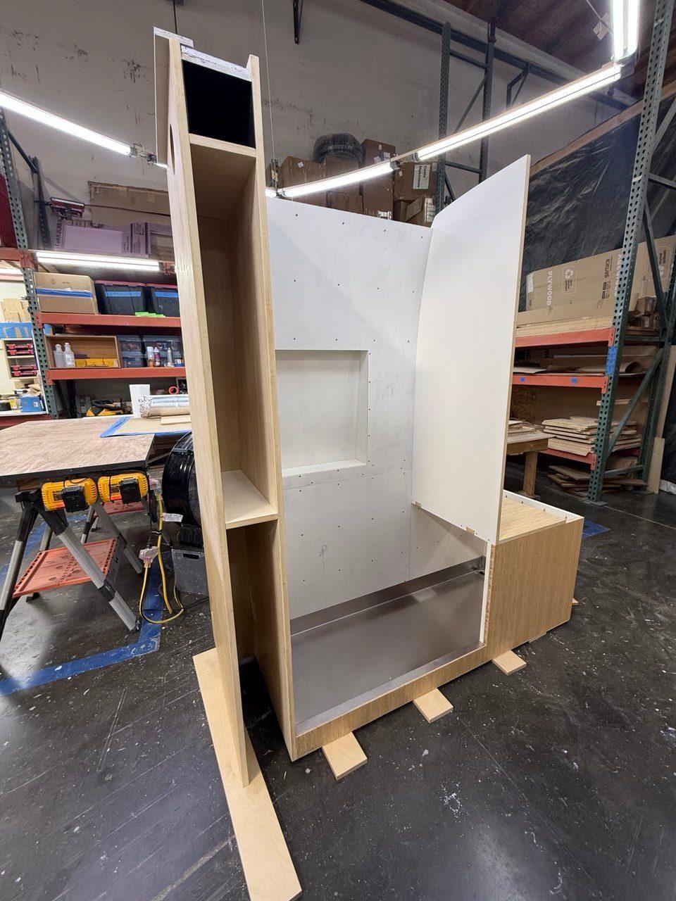 Shower enclosure being assembled in the workshop
