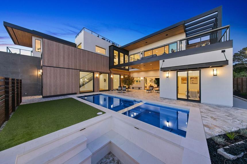 Modern rental home with a pool