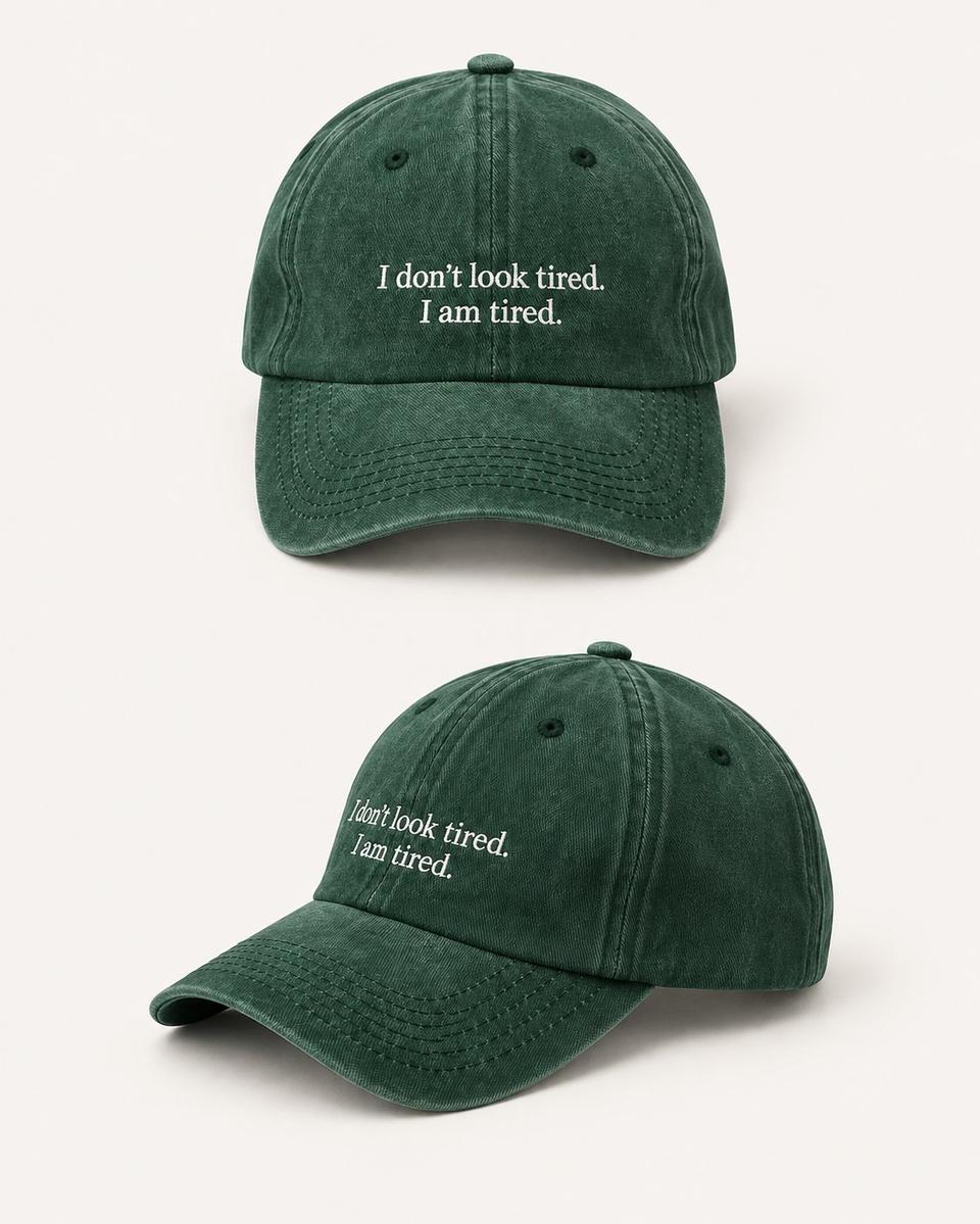 Green caps with embroidered text made for Greenline Connect
