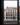 An exterior render of a modern brick apartment building. Render of the development project.