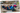 Kinderen op een hangmat bij het zand
