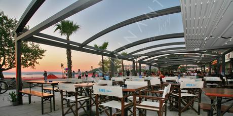 Oval retractable pergola