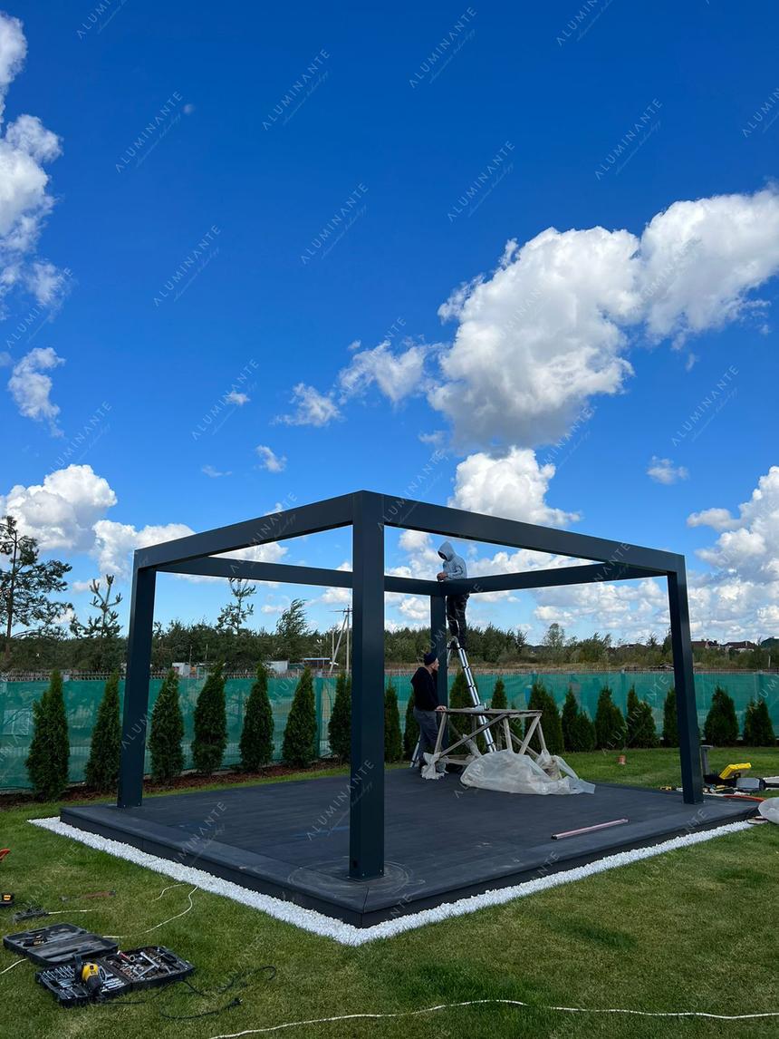 Installation of a freestanding louvered pergola, photo 3