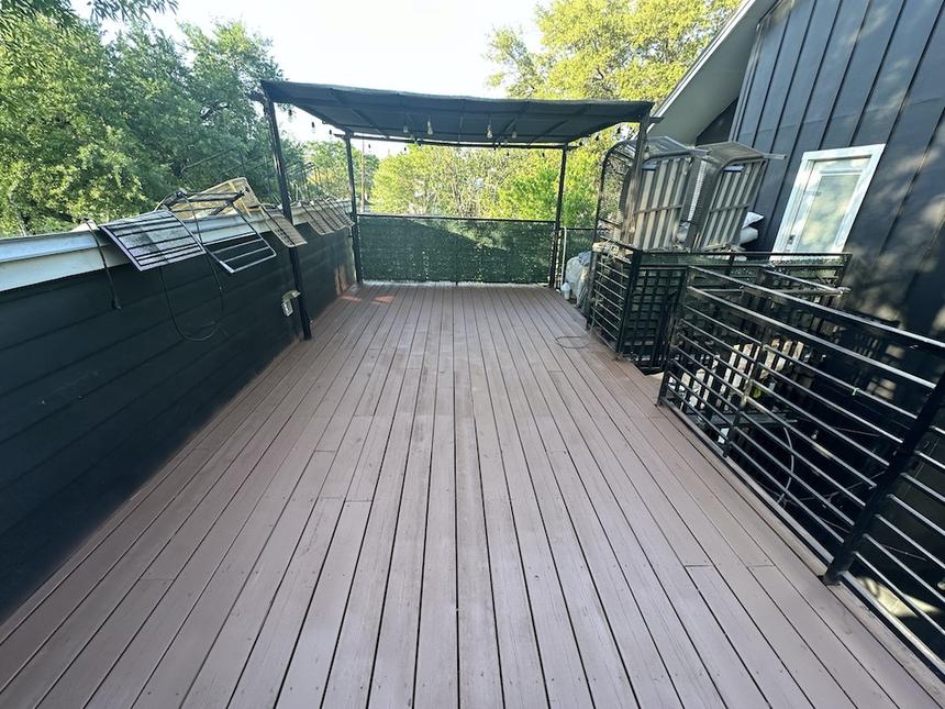 Downtown Austin wood terrace floor repair and painting — photo 9