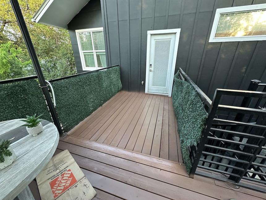 Downtown Austin wood terrace floor repair and painting — after