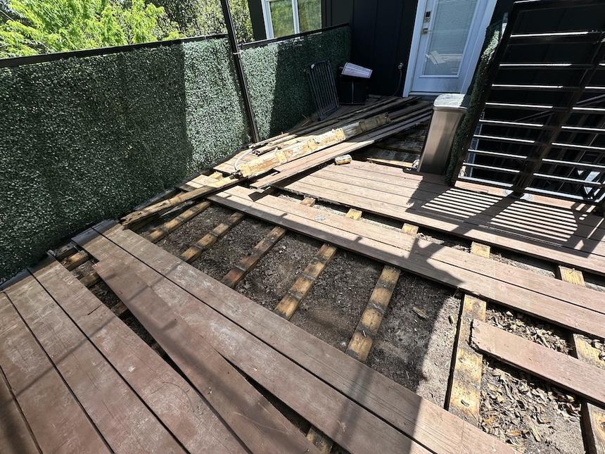 Downtown Austin wood terrace floor repair and painting — photo 2