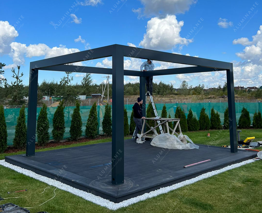 Installation of a freestanding louvered pergola, photo 1