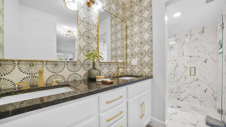 Bathroom vanity with gold fixtures