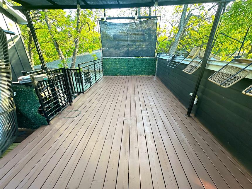 Downtown Austin wood terrace floor repair and painting — photo 7
