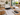 Bathroom renovation pricing and planning in Auckland with floor plans, laptop, calculator and material samples