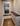Mudroom storage cabinet with large hall mirror and built-in bench