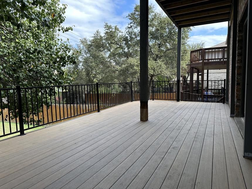 Wood to composite deck upgrade Austin TX — two level terrace restoration with composite boards