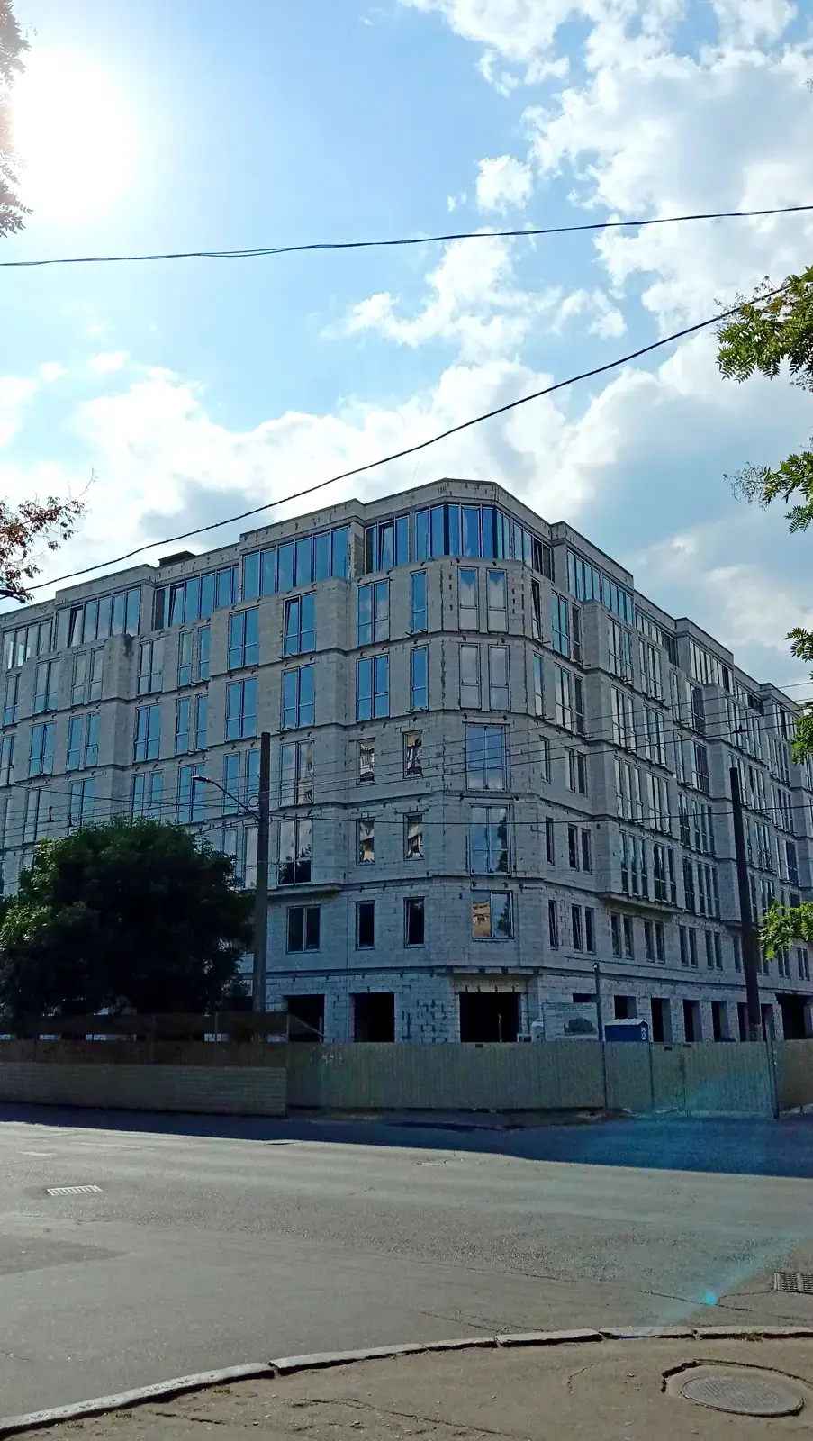 Отделка фасада доходного дома Salve — фото строительства