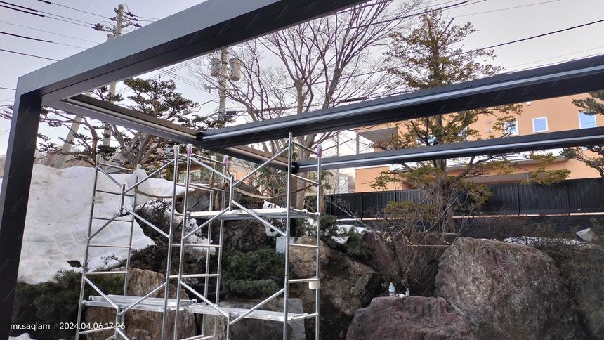 Wall-mounted louvered pivot-sliding pergola in two modules, photo 24