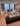 Completed Bal Harbour penthouse living room with sectional sofa and ocean-view windows