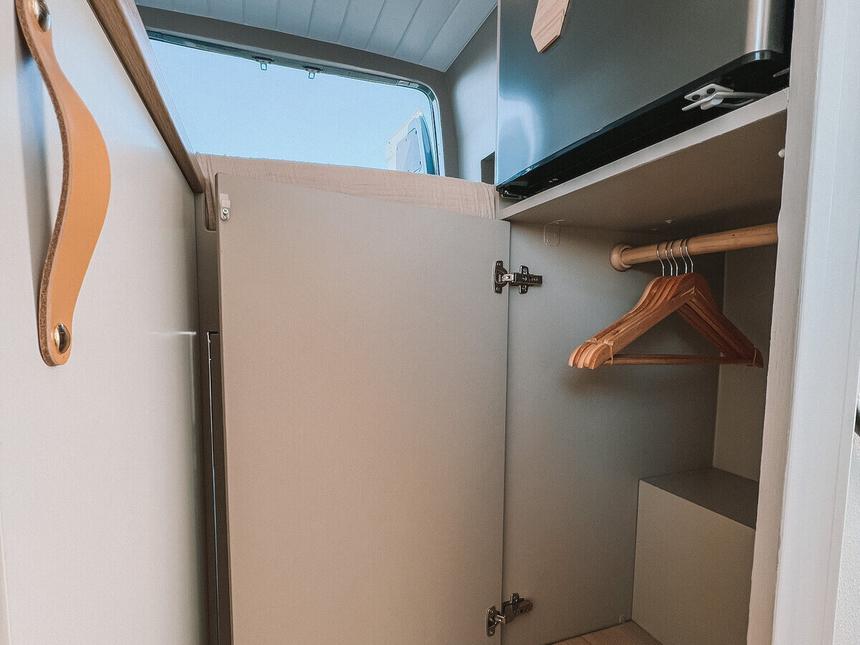 A real closet in a Tiny Planet van