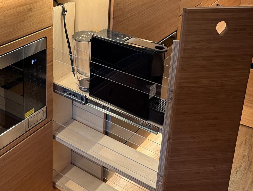 Pantry with a coffee machine in a Tiny Planet van