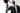 Image of business professionals shaking hands in a corporate setting