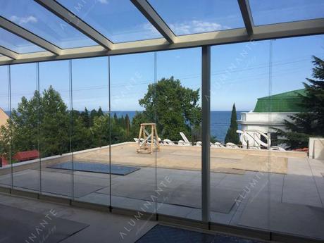 Terrace with a sea view and a PRADA glass roof