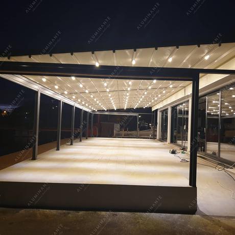 Wall-mounted retractable pergola 18 m wide