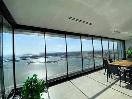 Business center panoramic glazing with railings on the 21st floor