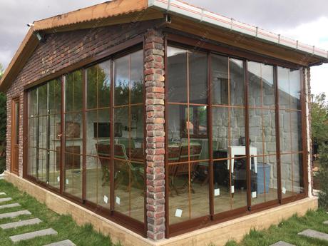 House summer kitchen with sliding double glazing