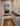 Mudroom storage cabinet with large hall mirror and built-in bench