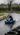 Blue kart driving on a wet track at Athboy Karting Centre
