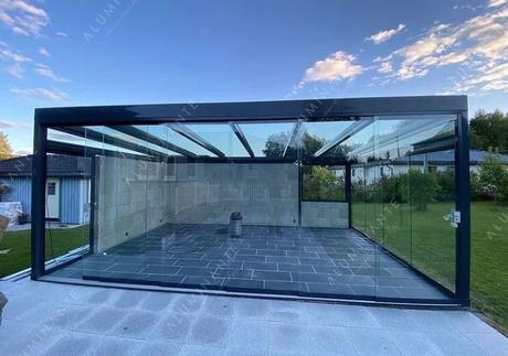 Enclosed gazebo with a transparent PRADA roof and frameless glazing