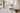 Kitchen renovation planning in Auckland with floor plans, material samples and measuring tools