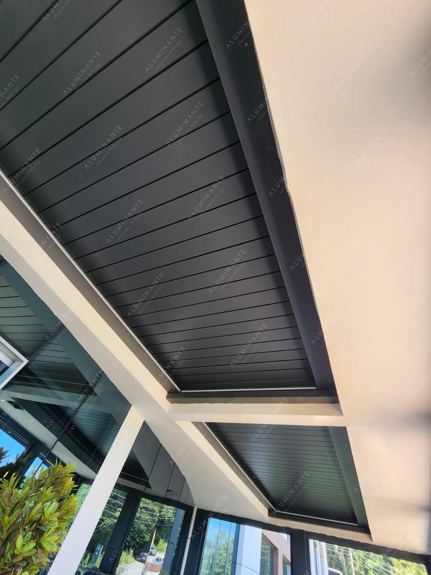 Louvered pergolas installed without supports in roof openings, photo 1