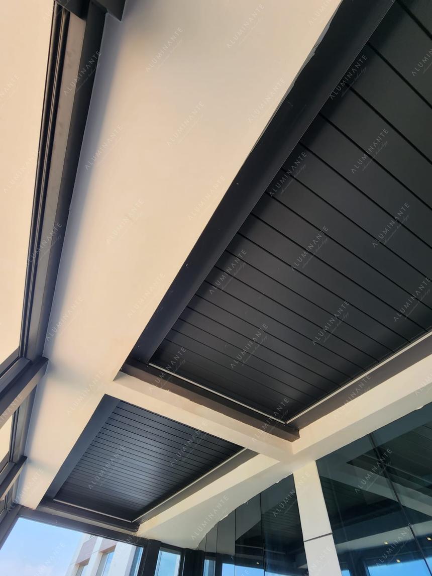 Louvered pergolas installed without supports in roof openings