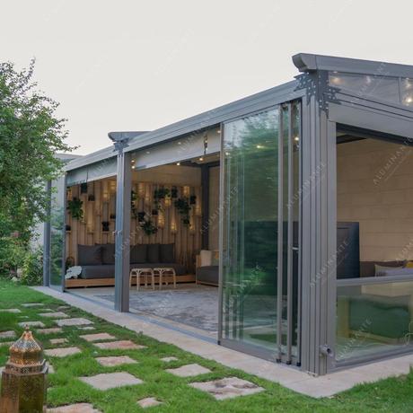 House backyard relaxation area with sliding double glazing and guillotine