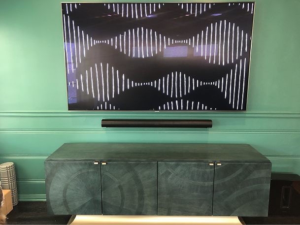 Display with soundbar, calibrated