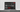 Laptop showing a red and white corporate logistics and customs website