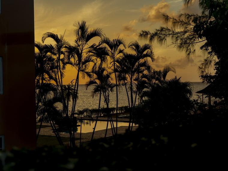 Sunset over the pool and ocean