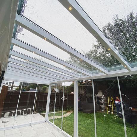 Enclosed terrace with a PRADA glass roof and lighting