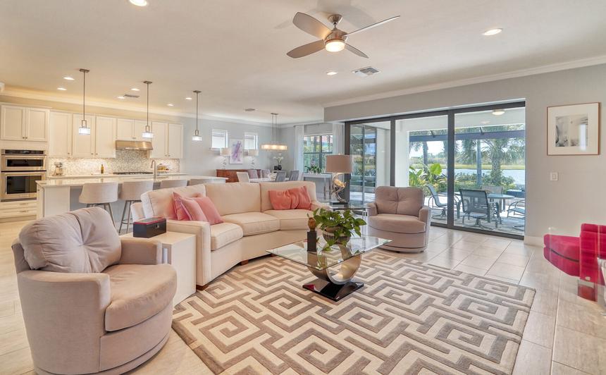 Open-plan great room of a furnished home