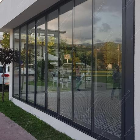 Café with panoramic sliding double glazing